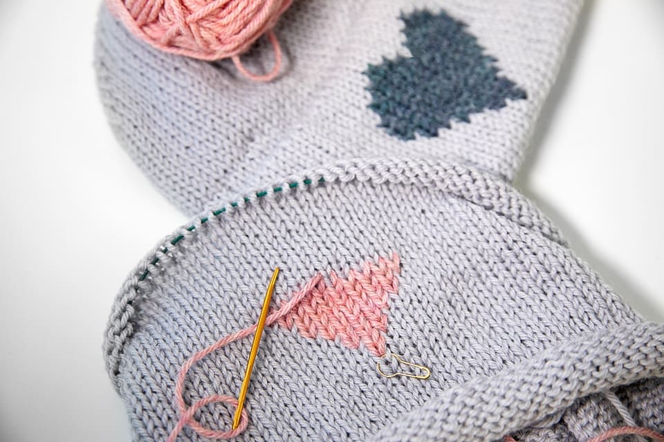 Simple Double Brim Beanie Knitting Pattern with Duplicate Stitch in progress
