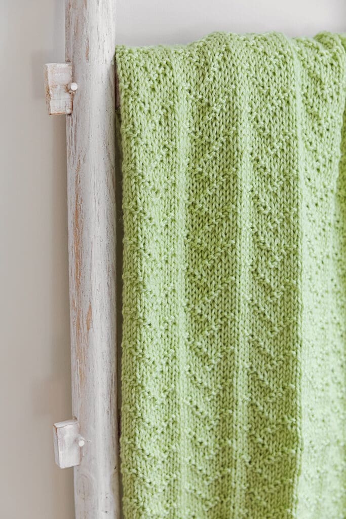 Ivy Knit Purl Baby Blanket on Ladder